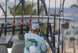 REG41 Angler Placing Rods In Rocket Launchers On Tower U3A6082 WG