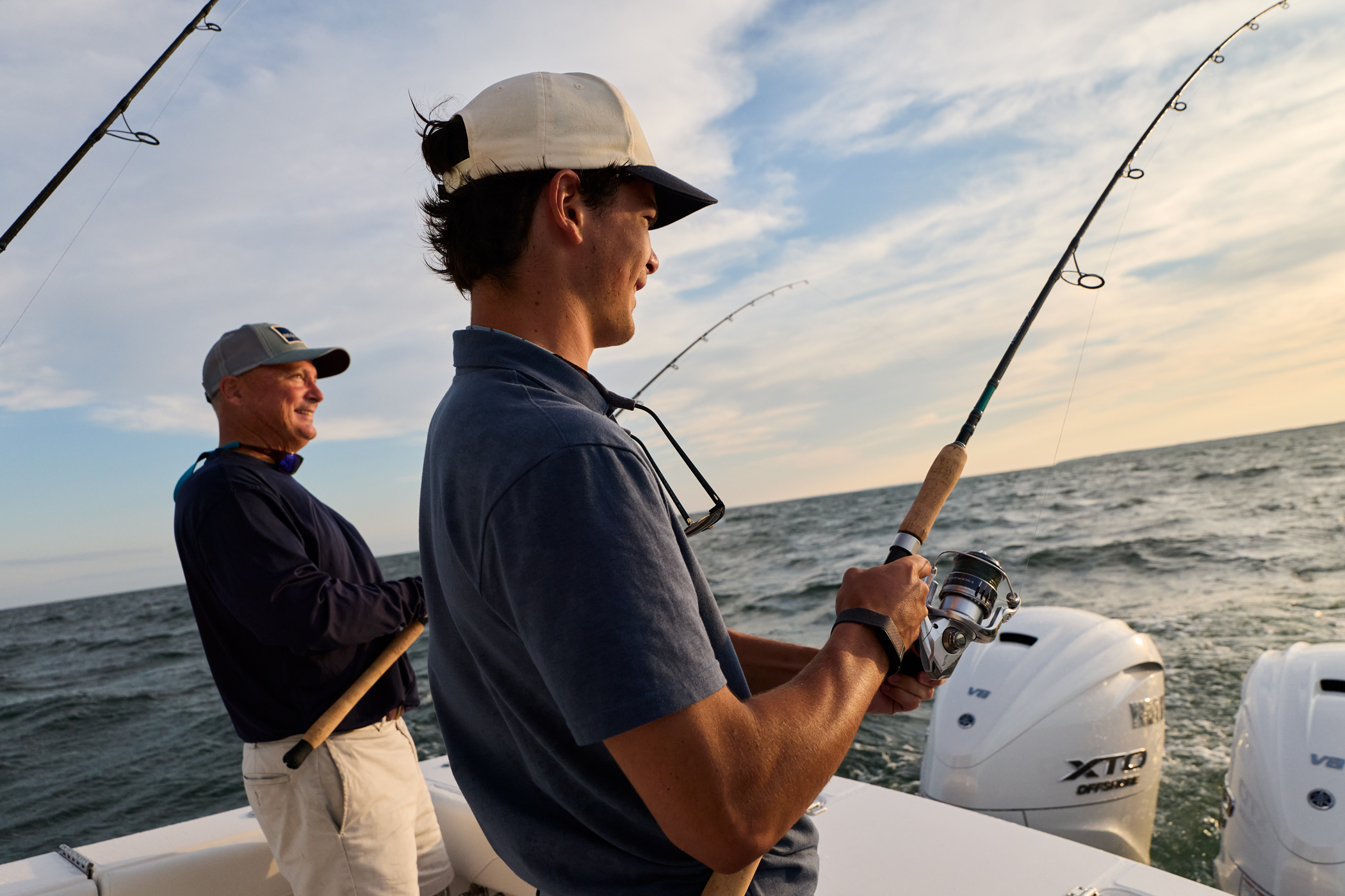 Reg31 2100X1400 Lifestyle Dad & Son Fish Transom Regulator Cape Cod 00 66 WG