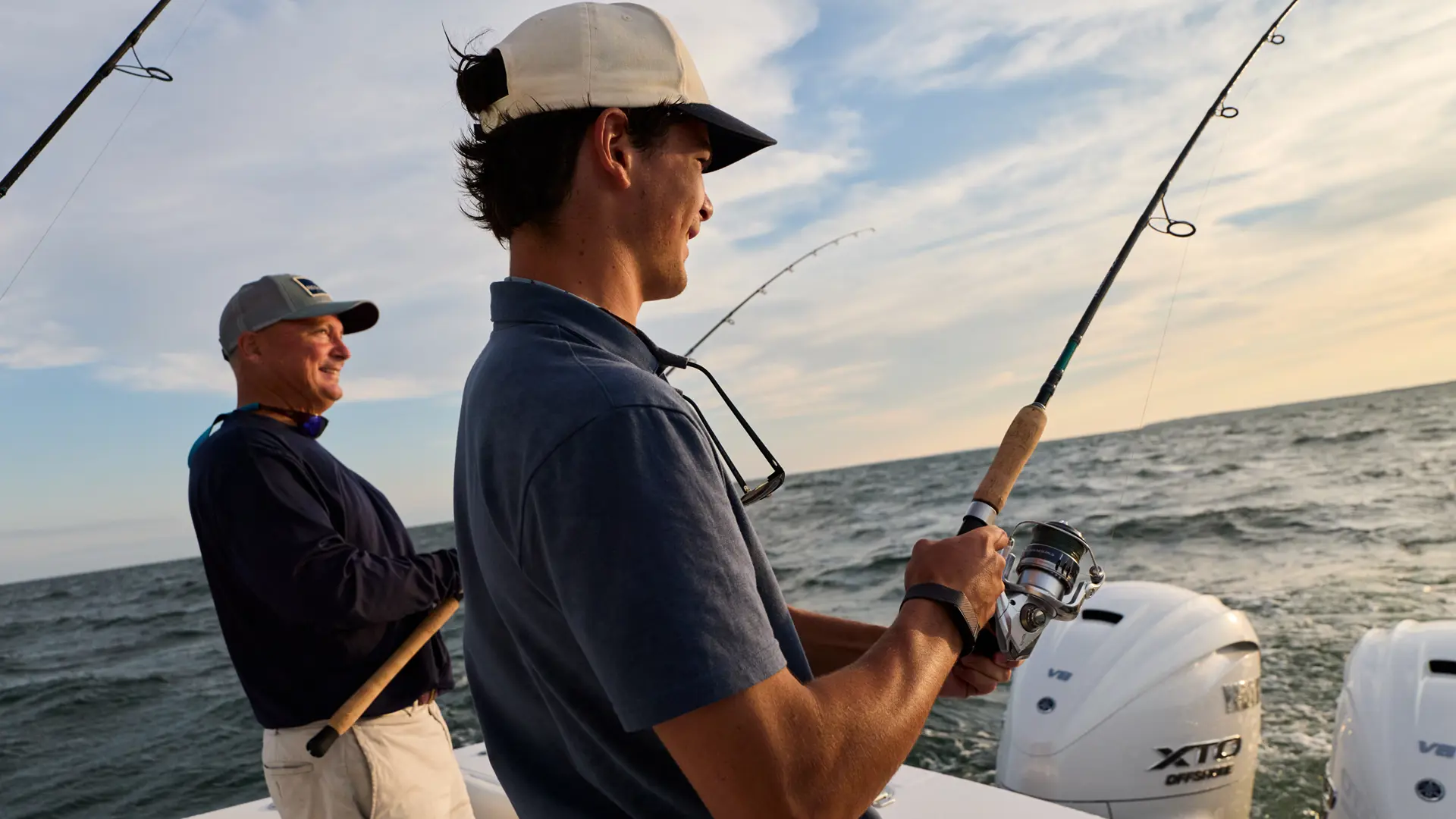 Reg31 2100X1400 Lifestyle Dad & Son Fish Transom Regulator Cape Cod 00 66 WG
